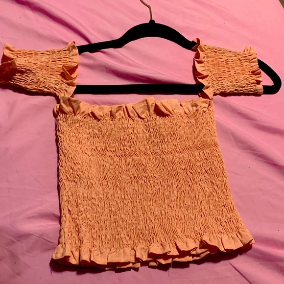 coral crop top with a ruffle bottom. It’s a size small medium - Picture 1 of 1